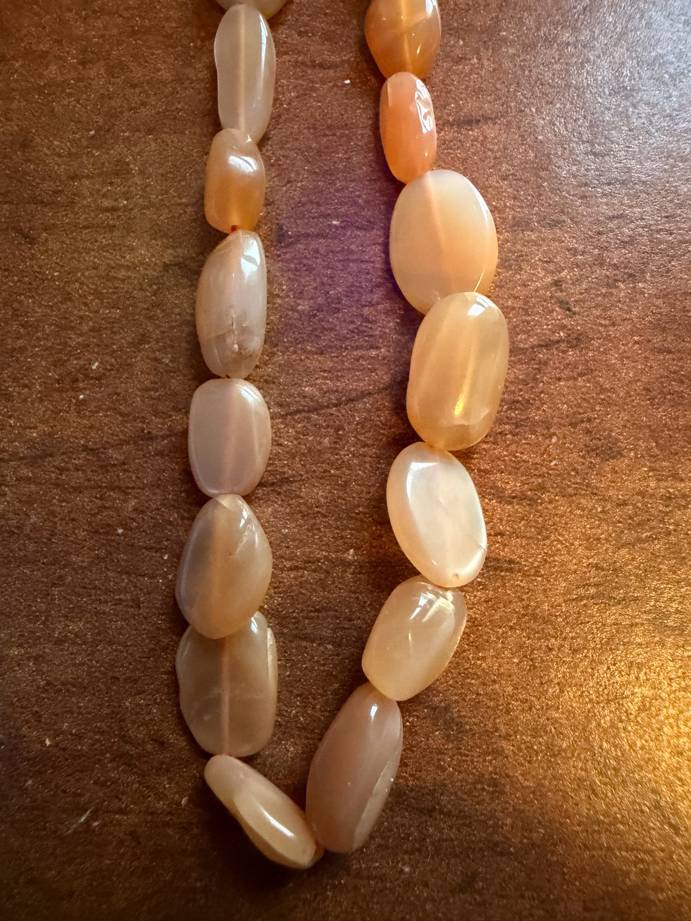 Strand of peach stone beads
